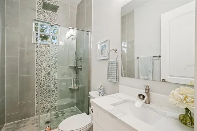 a view of a garage with rack and bicycle