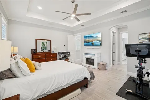 a bathroom with a double vanity sink mirror and shower