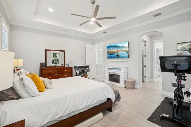 a bathroom with a double vanity sink mirror and shower