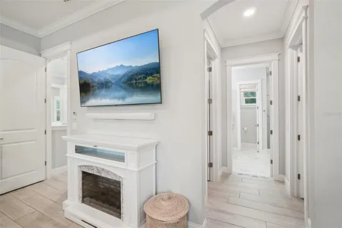 a bathroom with a tub shower and window