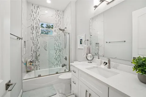 a view of a couches and tables in the patio