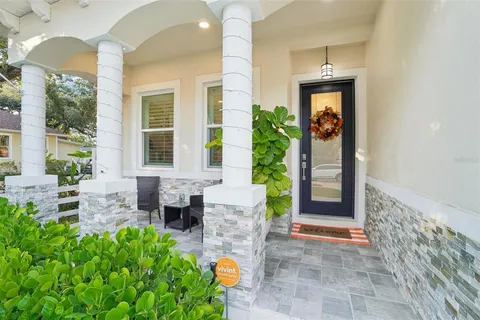 a front view of a house with a porch