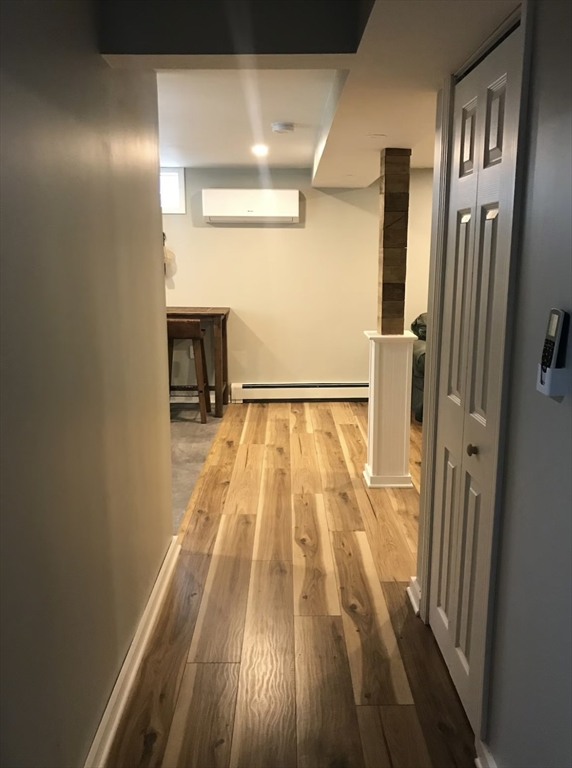 77 Governor Bradford Road, Unit B Brewster, MA 02631 - Photo 4 of 5 a view of empty room with wooden floor