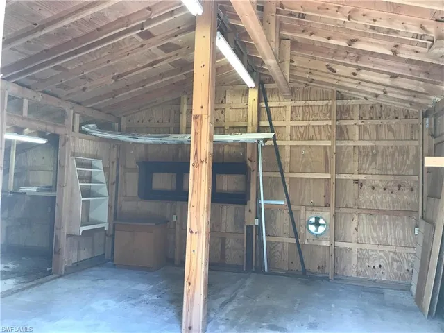 a view of empty room with windows