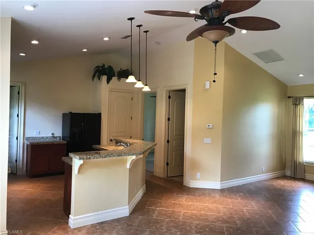 a view of a room with a washer and dryer
