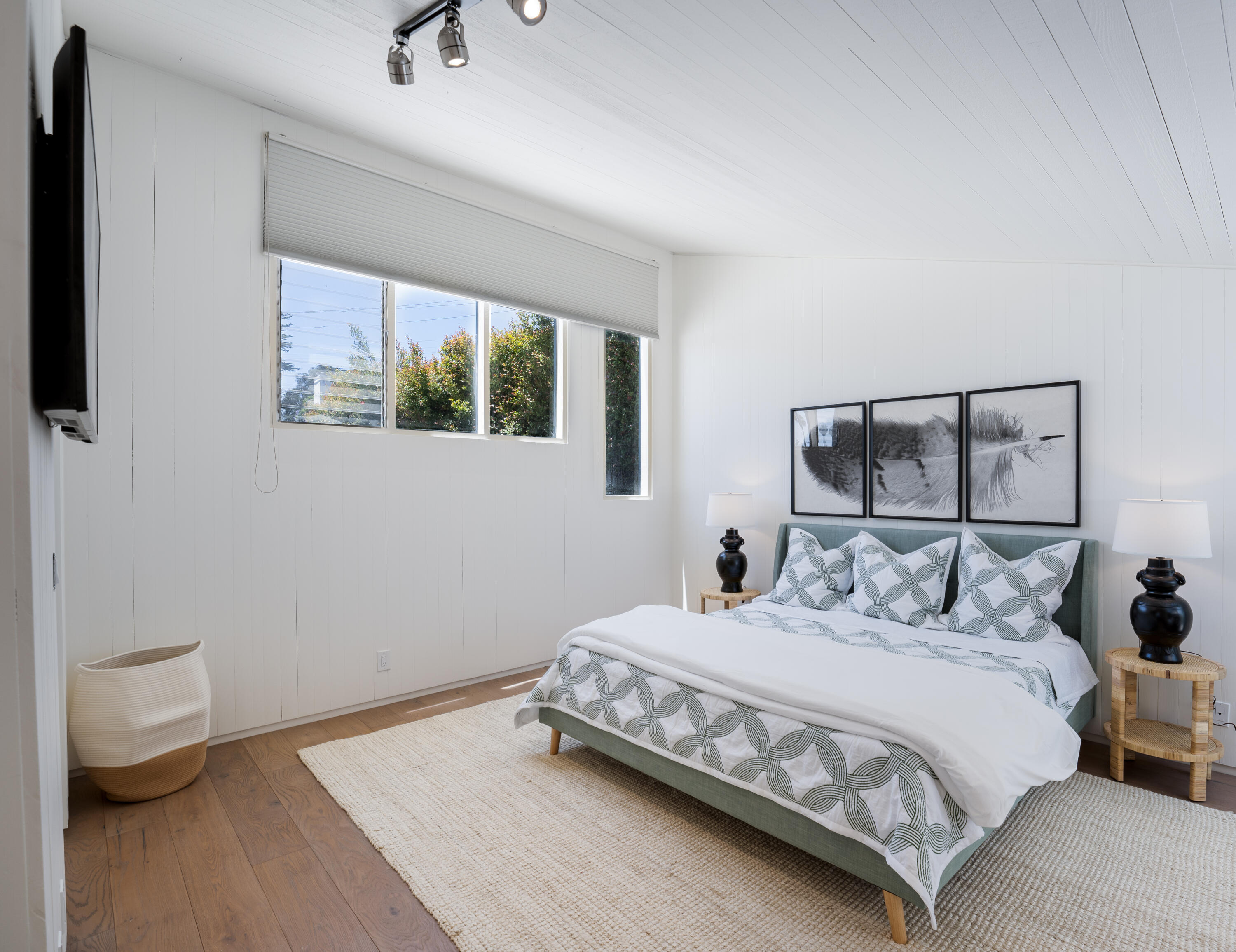 180 Hermosillo Road Montecito, CA 93108 - Photo 16 of 31 a bedroom with a bed and a painting on the wall