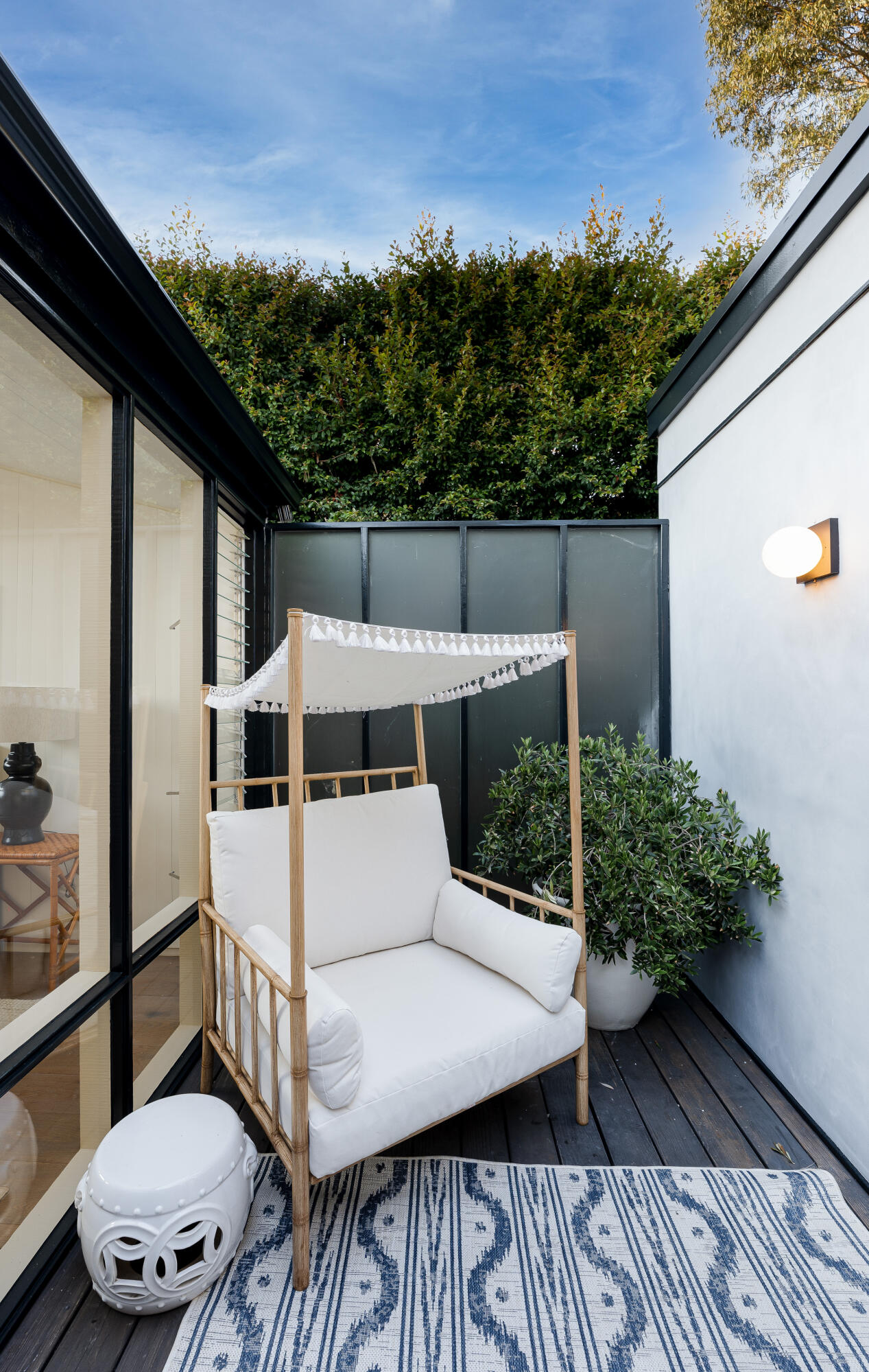 180 Hermosillo Road Montecito, CA 93108 - Photo 23 of 31 a view of a patio with table and chairs with wooden floor and fence