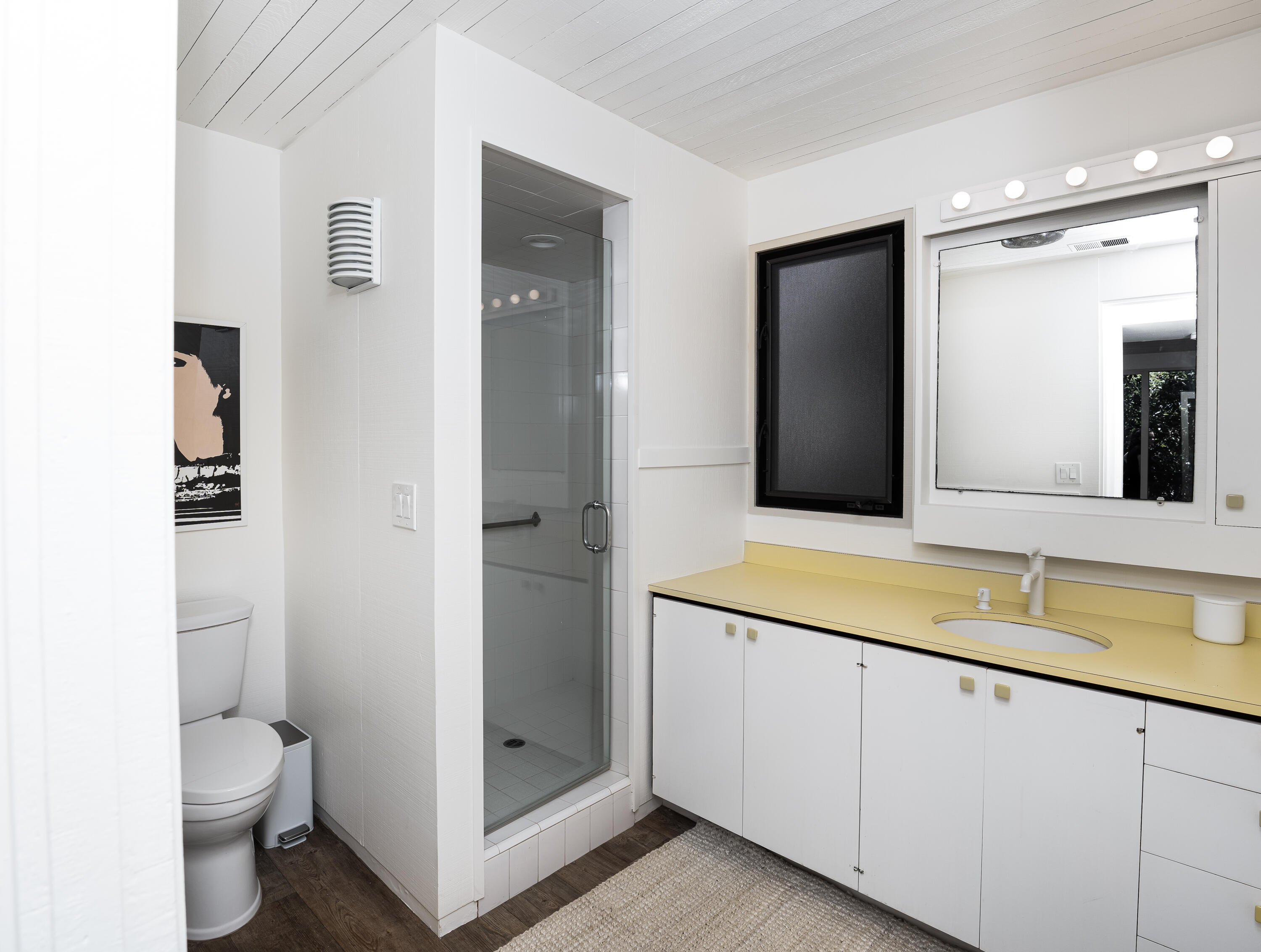 180 Hermosillo Road Montecito, CA 93108 - Photo 30 of 31 a bathroom with a sink and a mirror