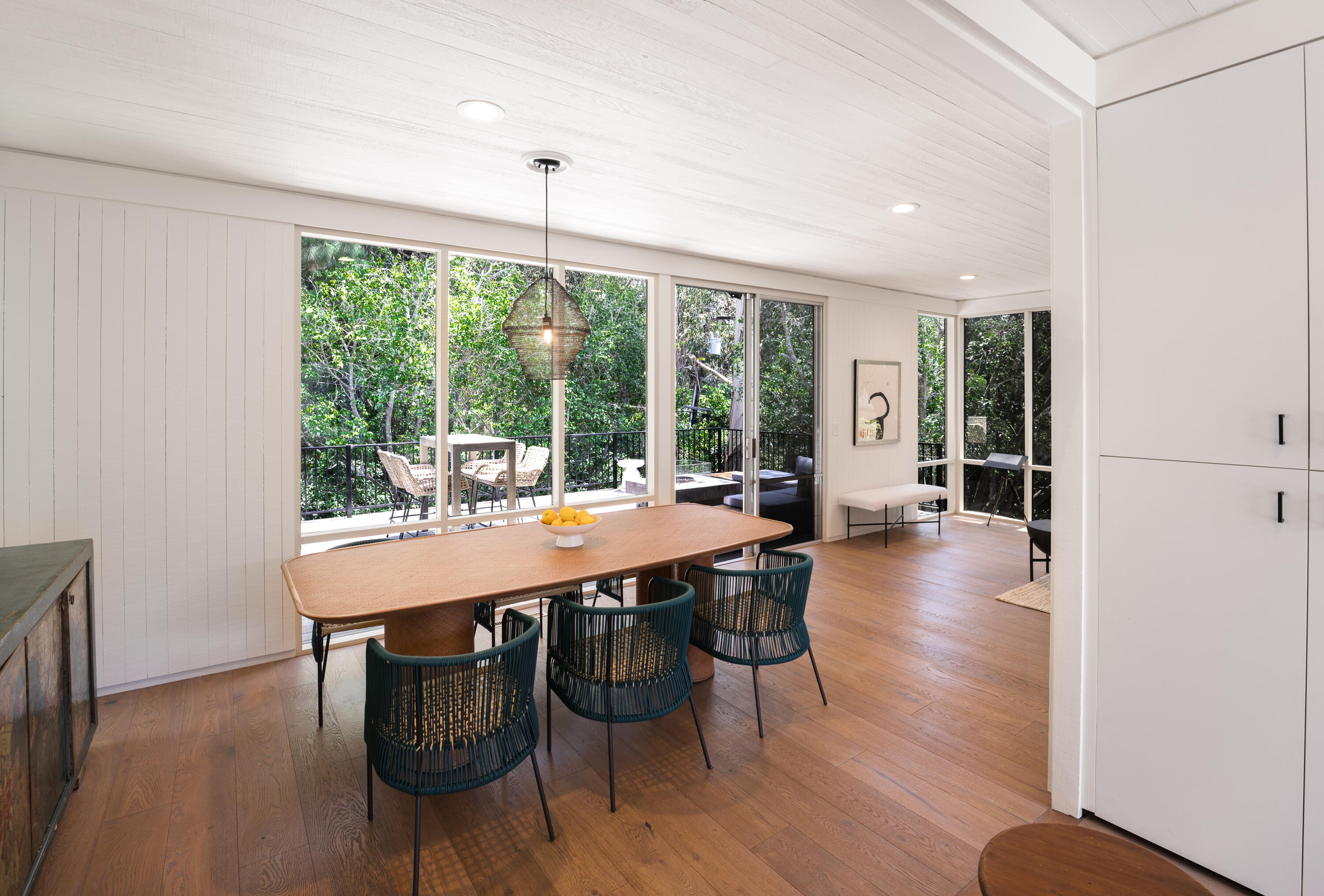 180 Hermosillo Road Montecito, CA 93108 - Photo 6 of 31 a view of a dining room with furniture window and wooden floor