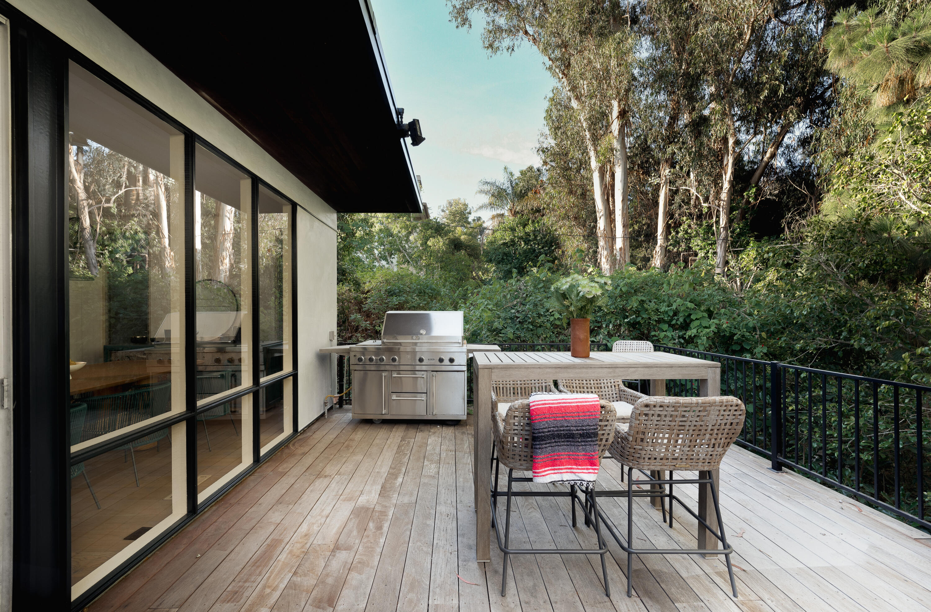 180 Hermosillo Road Montecito, CA 93108 - Photo 7 of 31 a view of a balcony with furniture and wooden floor