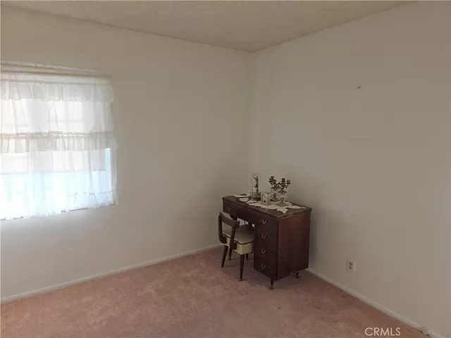 a view of an empty room with window