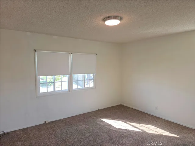 a bathroom with a sink and cabinets