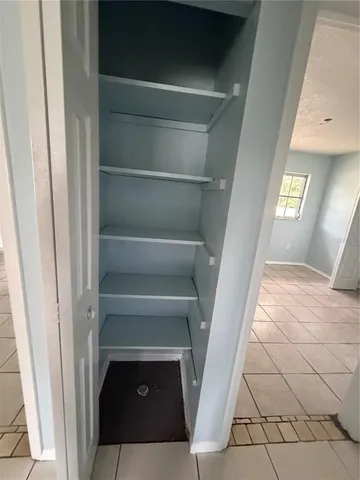 a view of a small space and a window