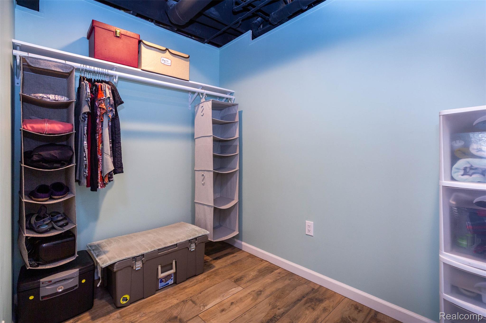 36039 Curtis Road Livonia, MI 48152 - Photo 44 of 61 Integrated closet system featuring a hanging rod and shelving