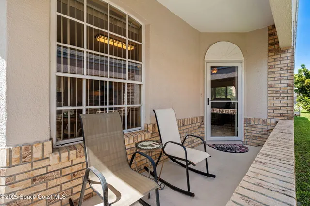 a view of a lounge chairs in the balcony