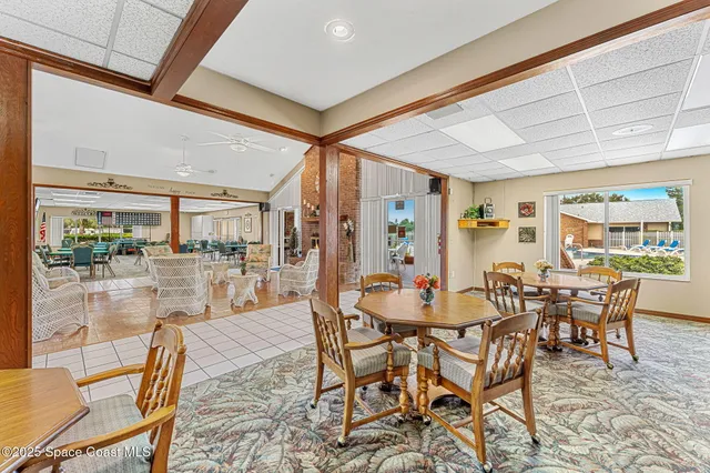 a view of a room with wooden floor and city shower