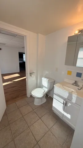 a bathroom with a sink a toilet and a bathtub