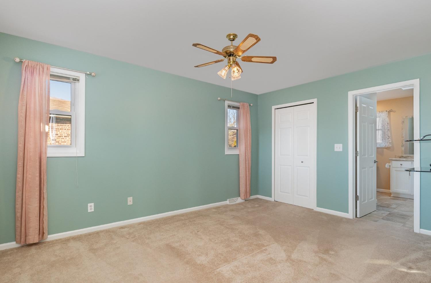 1286 Brandywine Road Crown Point, IN 46307 - Photo 16 of 30 a view of a workspace with wooden floor and a chandelier fan