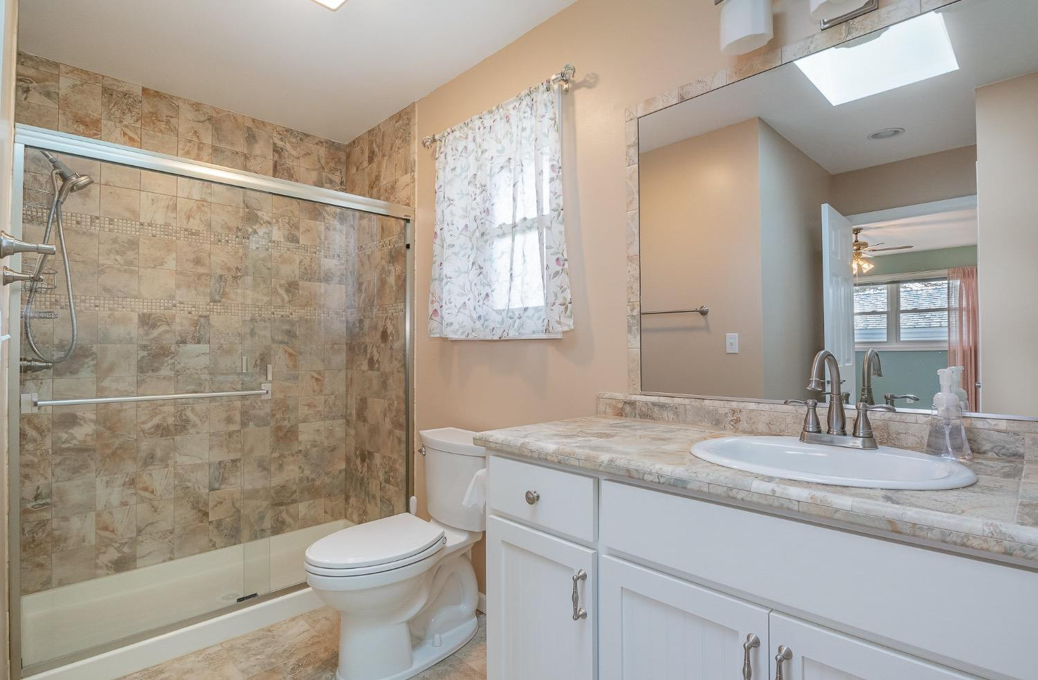 1286 Brandywine Road Crown Point, IN 46307 - Photo 18 of 30 a bathroom with a sink toilet and shower