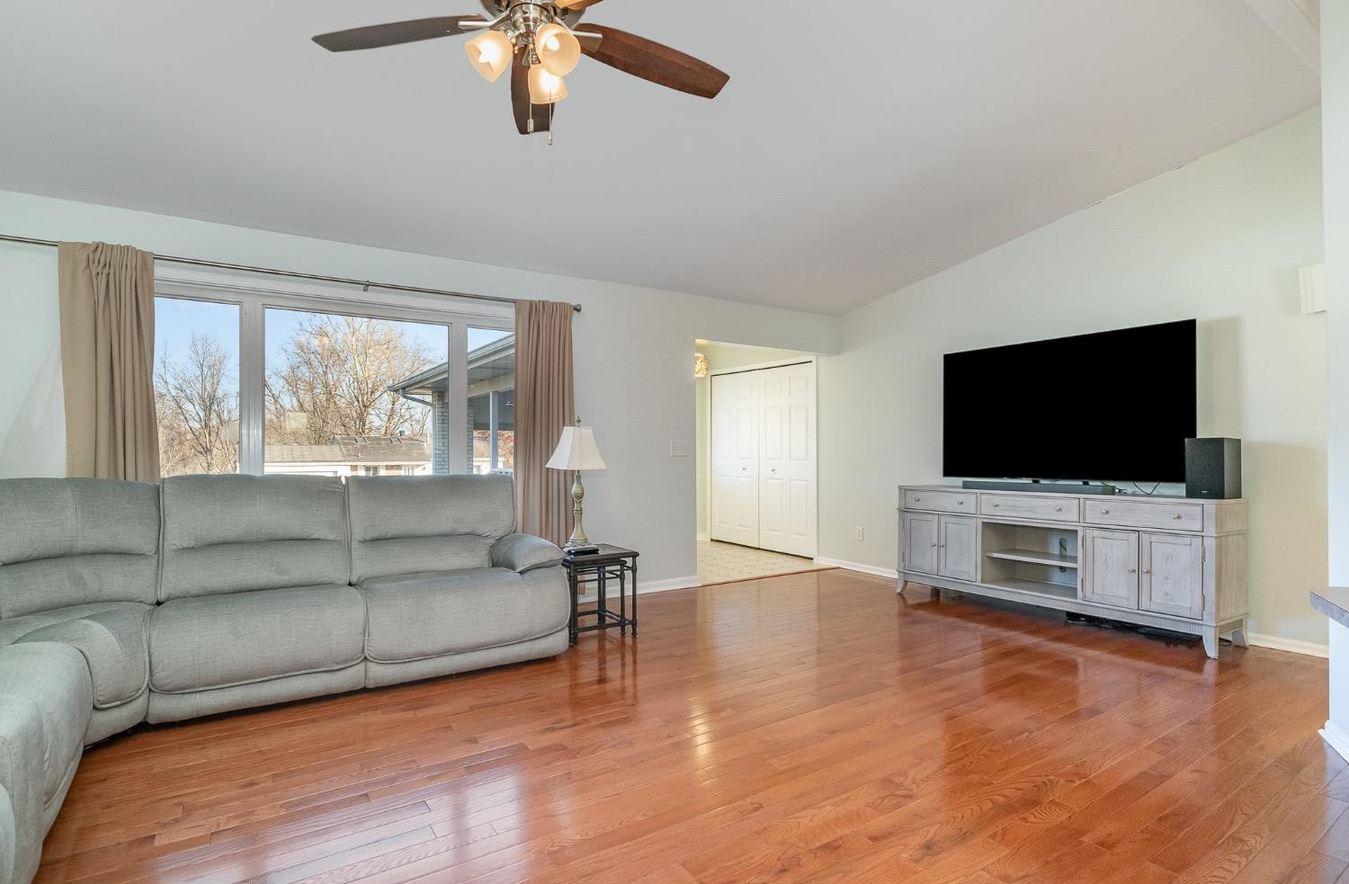 1286 Brandywine Road Crown Point, IN 46307 - Photo 4 of 30 a living room with furniture and a flat screen tv