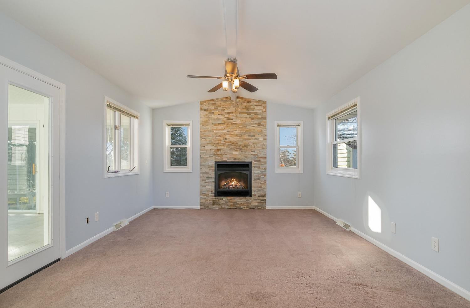 1286 Brandywine Road Crown Point, IN 46307 - Photo 6 of 30 a view of a livingroom with a fireplace and window