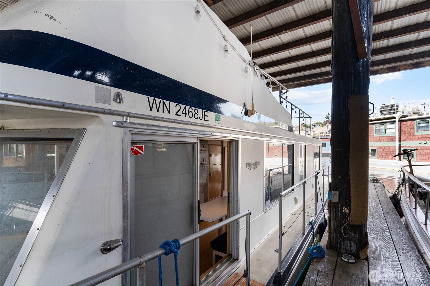 2401 North Northlake Way Seattle, WA 98103 - Photo 16 of 32 a view of a hallway with wooden floor and staircase