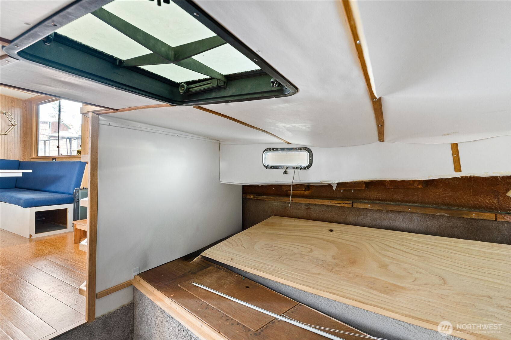 2401 North Northlake Way Seattle, WA 98103 - Photo 20 of 32 a bedroom with a bed and a window