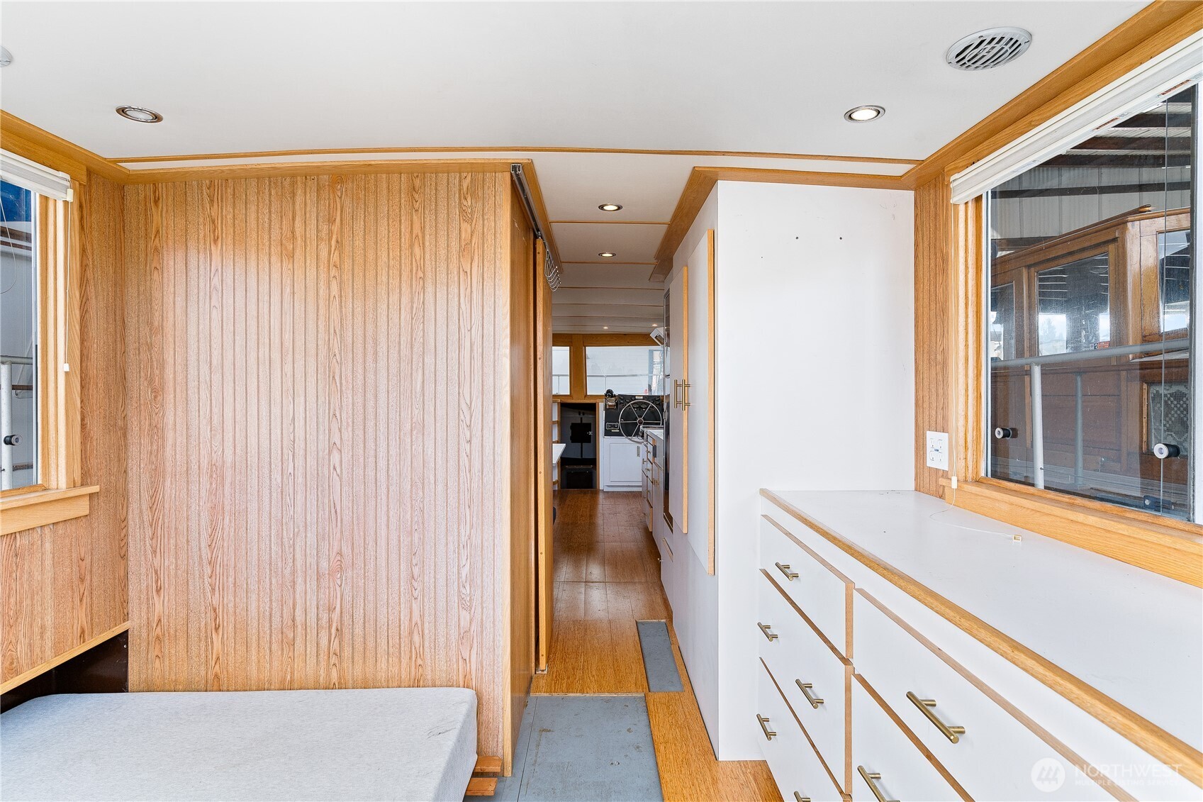 2401 North Northlake Way Seattle, WA 98103 - Photo 10 of 32 a view of a hallway with wooden floor and staircase