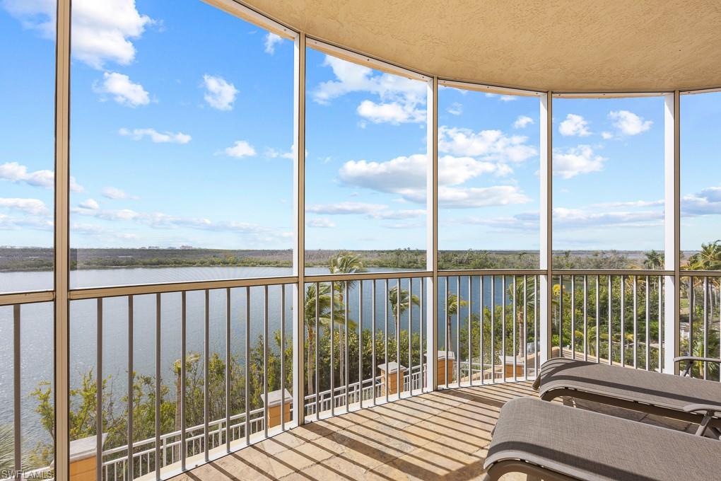 a view of a balcony with lake view and a balcony