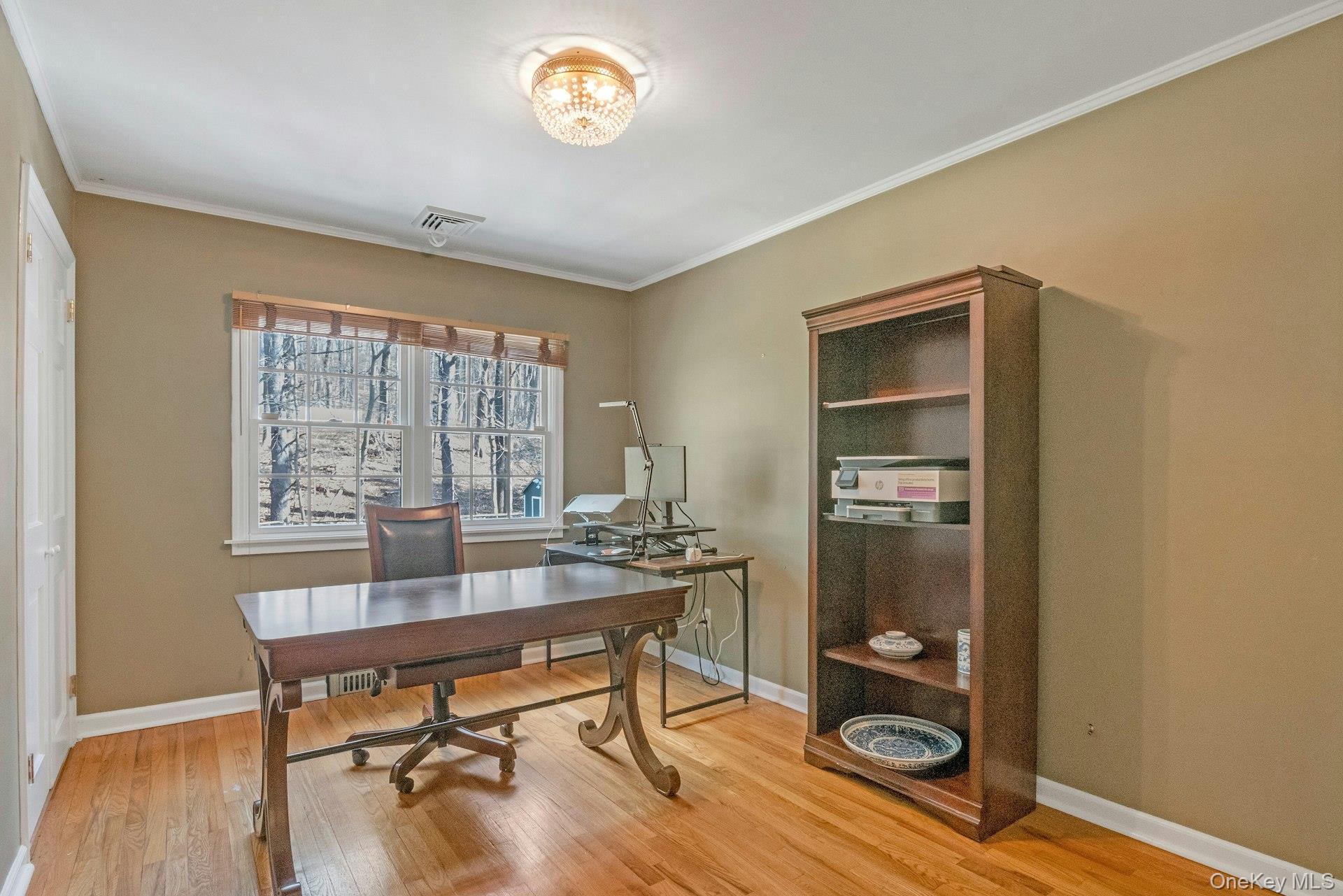 31 Orchard Road Briarcliff Manor, NY 10510 - Photo 14 of 33 a workspace with wooden floor