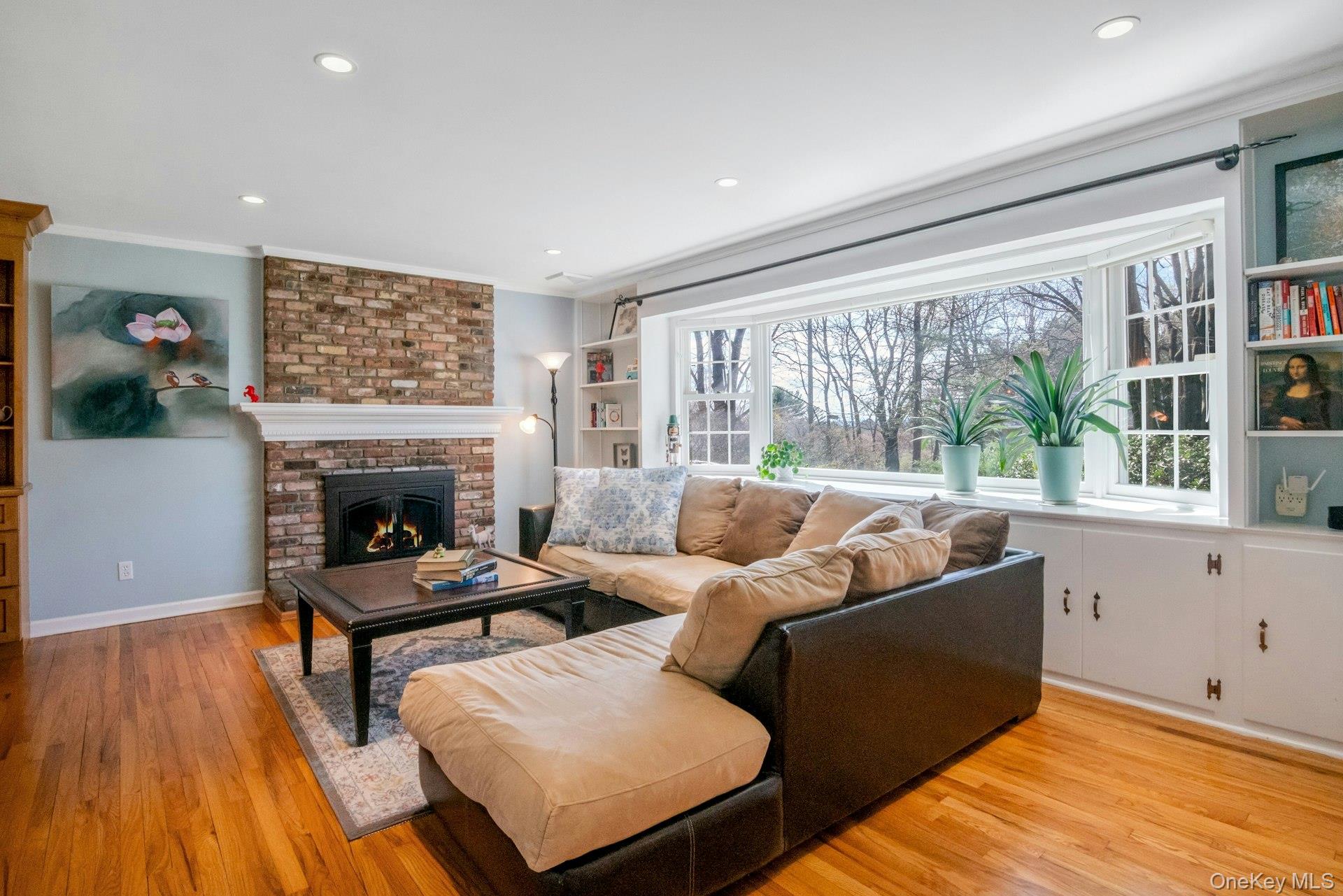 31 Orchard Road Briarcliff Manor, NY 10510 - Photo 2 of 33 a living room with furniture and a fireplace