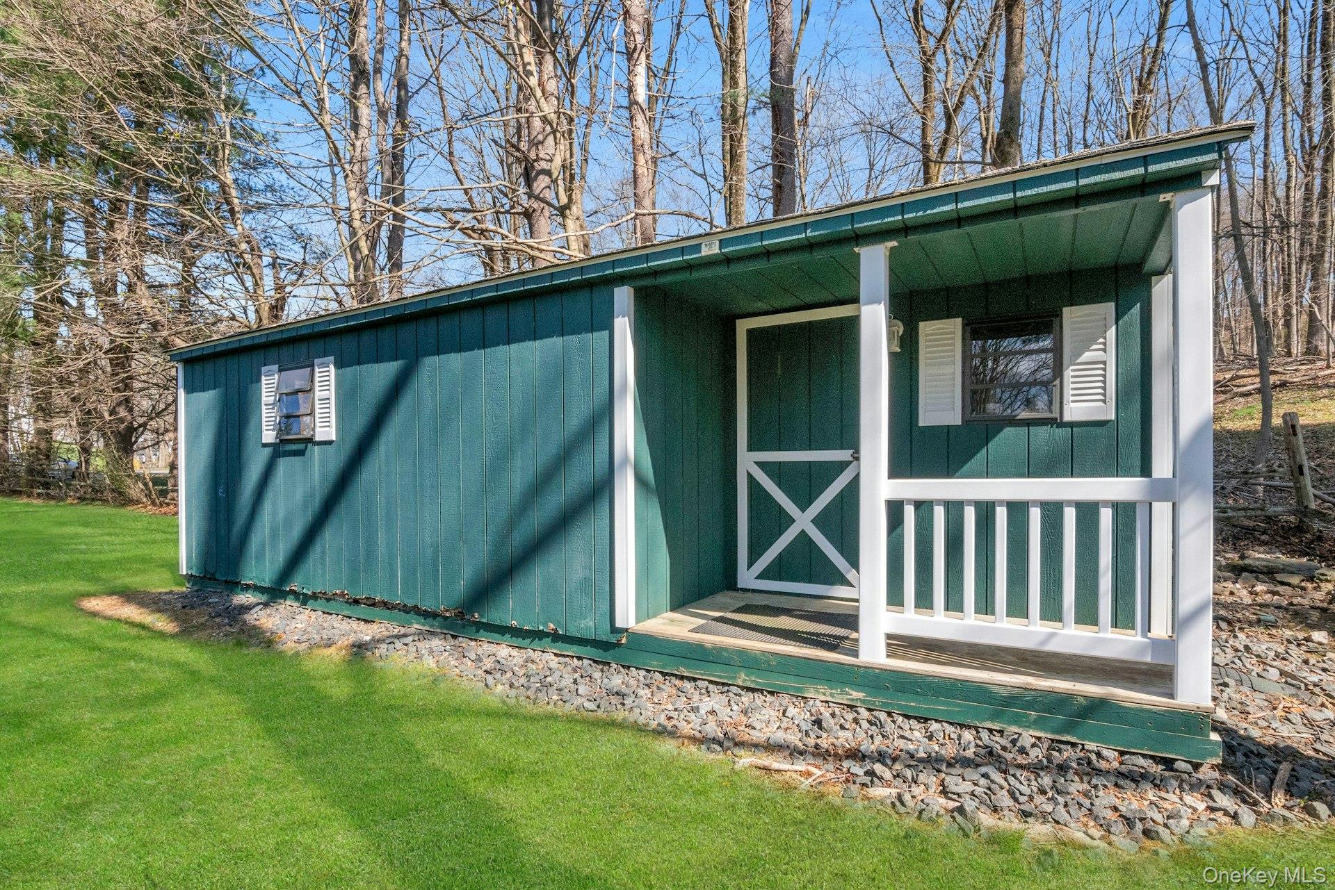 31 Orchard Road Briarcliff Manor, NY 10510 - Photo 22 of 33 a view of a house with a yard