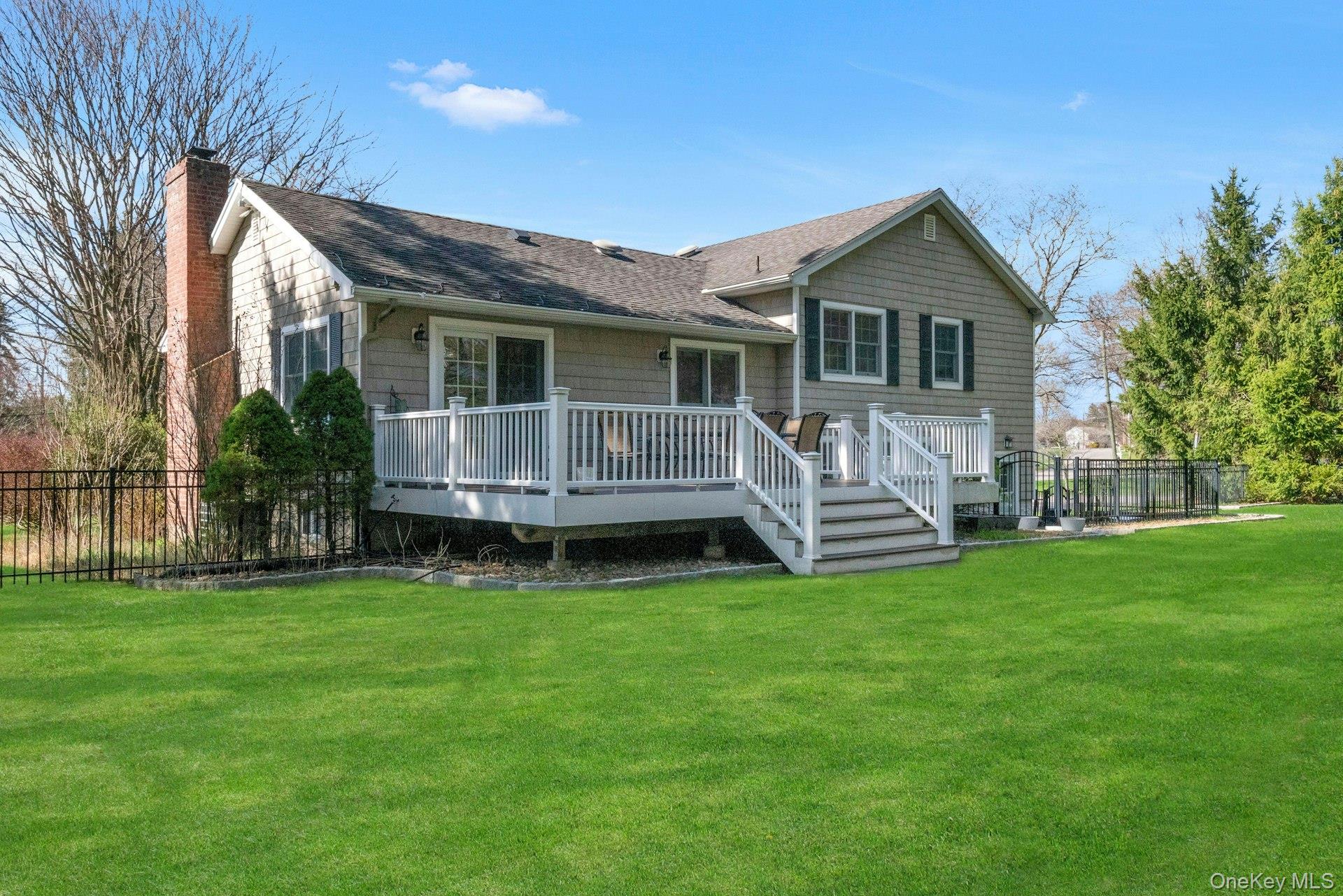 31 Orchard Road Briarcliff Manor, NY 10510 - Photo 26 of 33 a view of a house with a yard