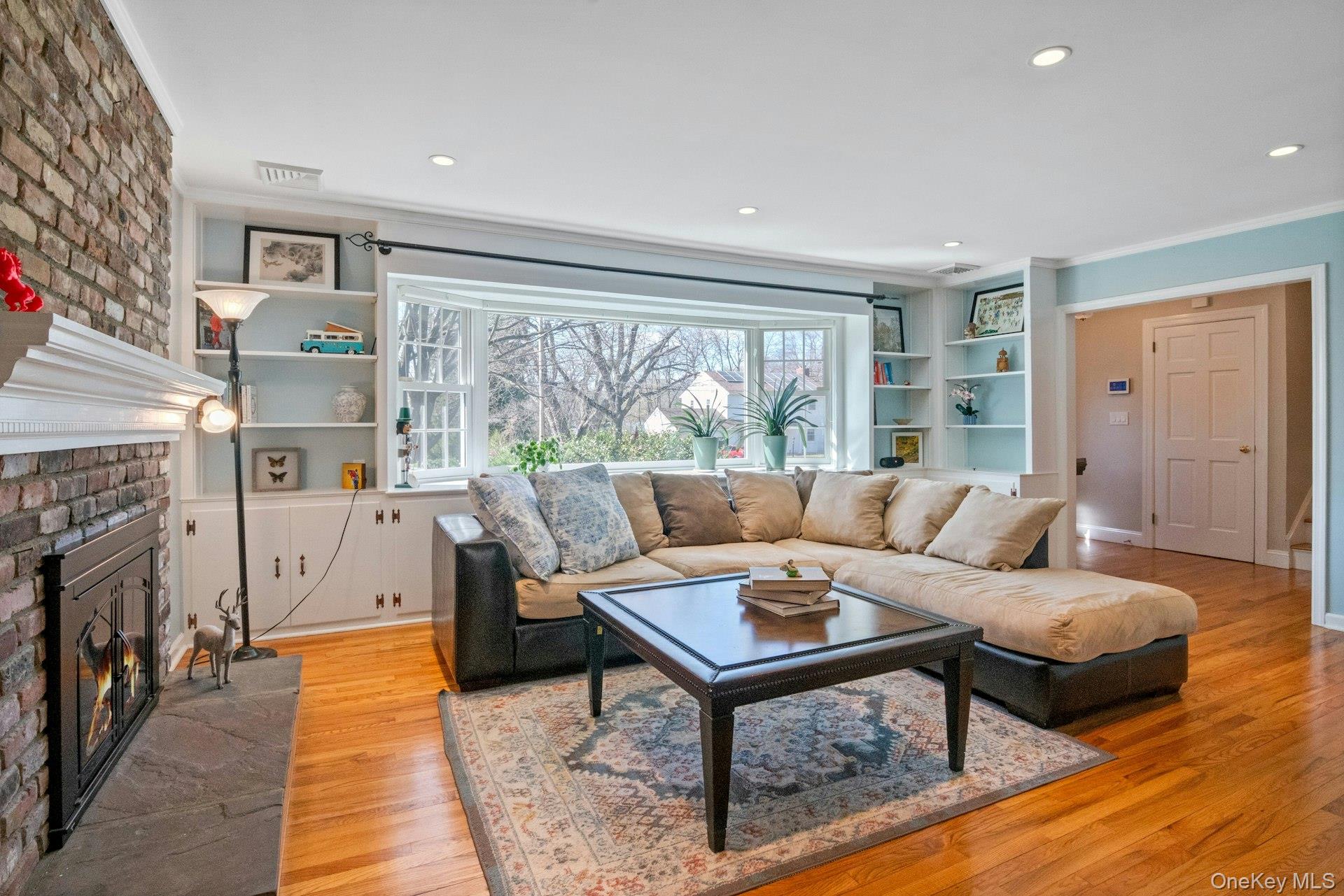 31 Orchard Road Briarcliff Manor, NY 10510 - Photo 33 of 33 a living room with furniture and a fireplace