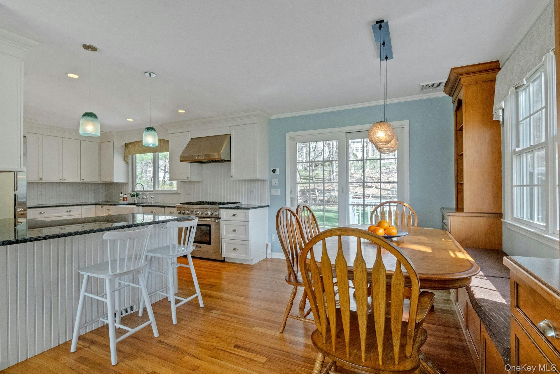 31 Orchard Road Briarcliff Manor, NY 10510 - Photo 4 of 33 a view of a dining room with furniture and wooden floor