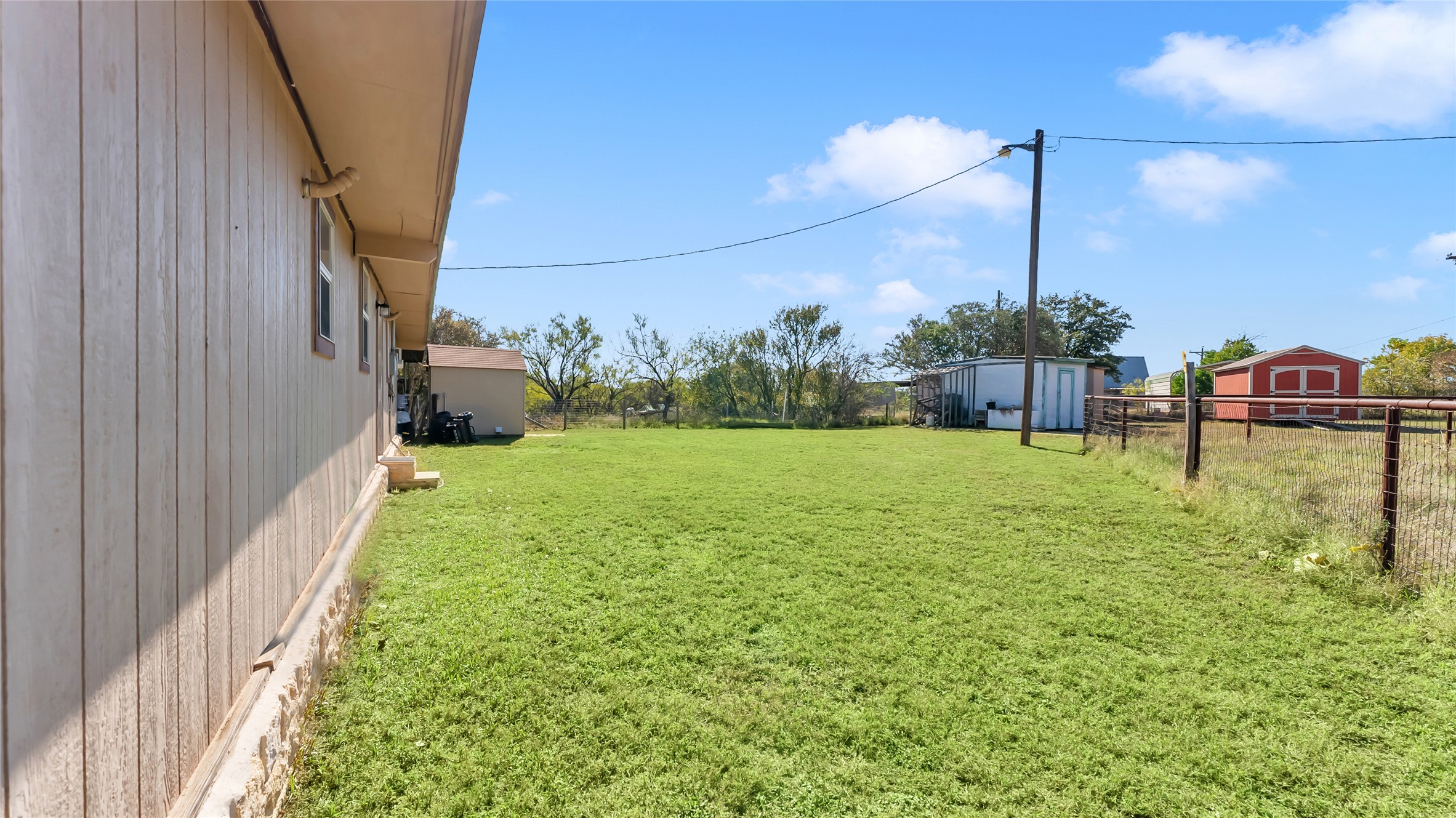 1415 Bee Lane Tow, TX 78672 - Photo 17 of 39 a view of a backyard
