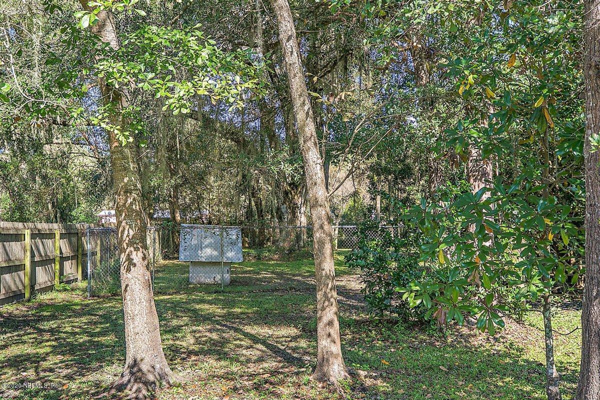542188 Lem Turner Road Callahan, FL 32011 - Photo 29 of 34 a view of a trees in front of a yard