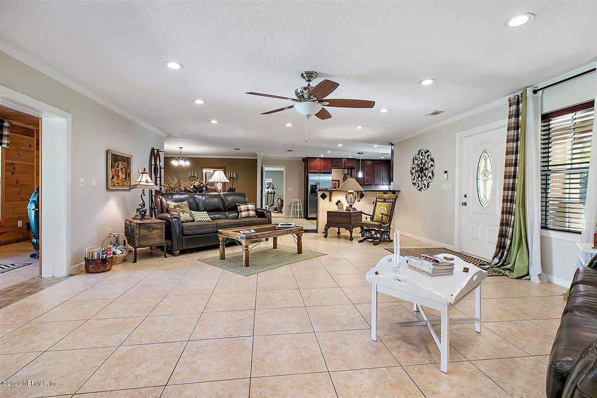 542188 Lem Turner Road Callahan, FL 32011 - Photo 5 of 34 a view of a livingroom with furniture and a window