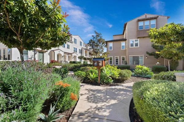 a front view of a multi story residential apartment buildings