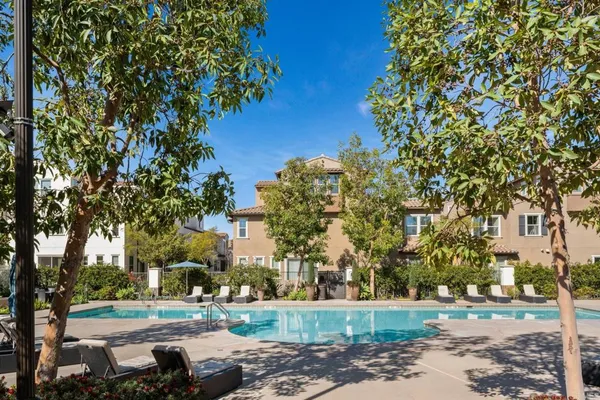 a view of a swimming pool with a patio