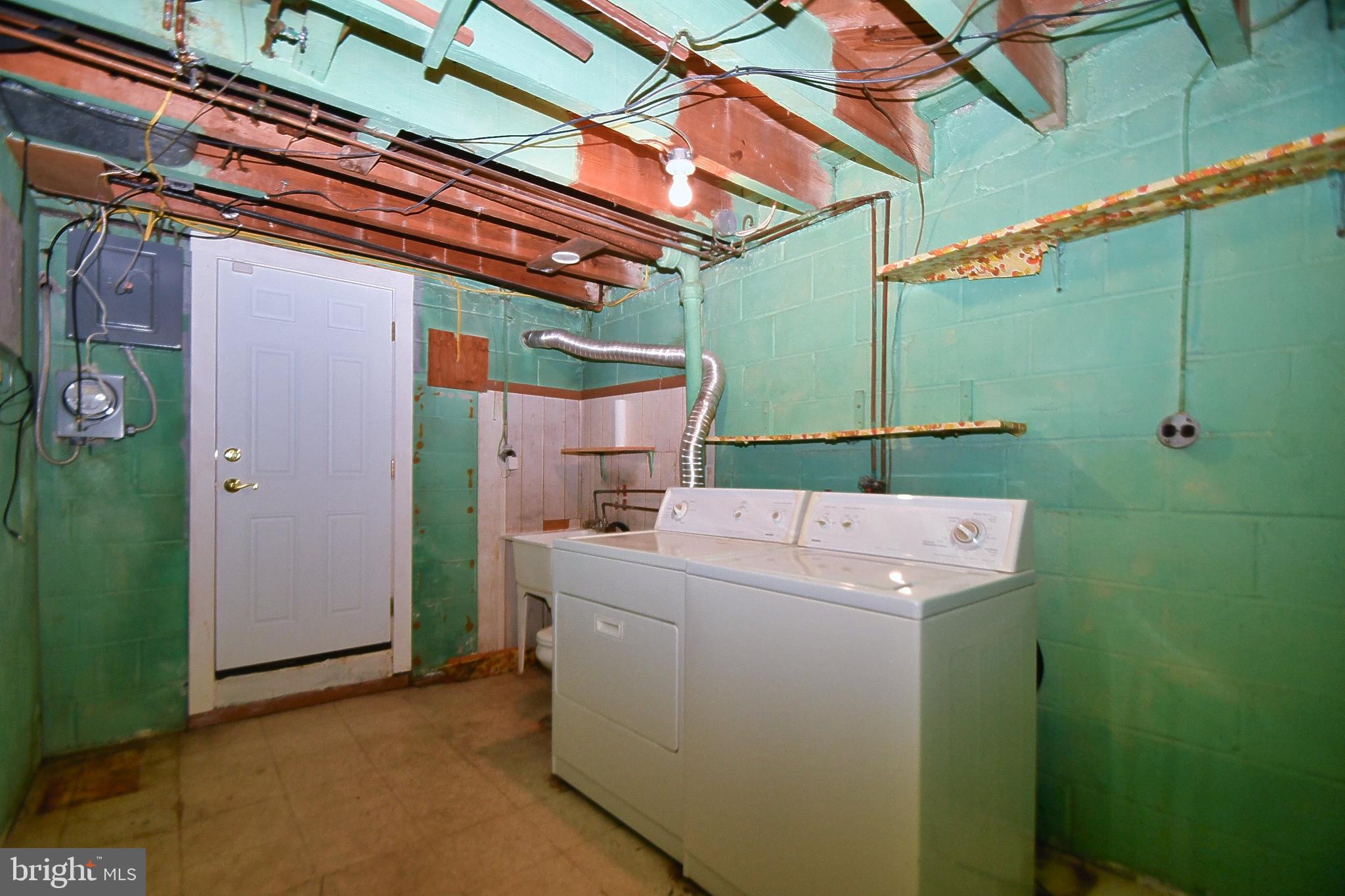 1041 Arncliffe Road Baltimore, MD 21221 - Photo 40 of 40 a utility room with dryer and washer