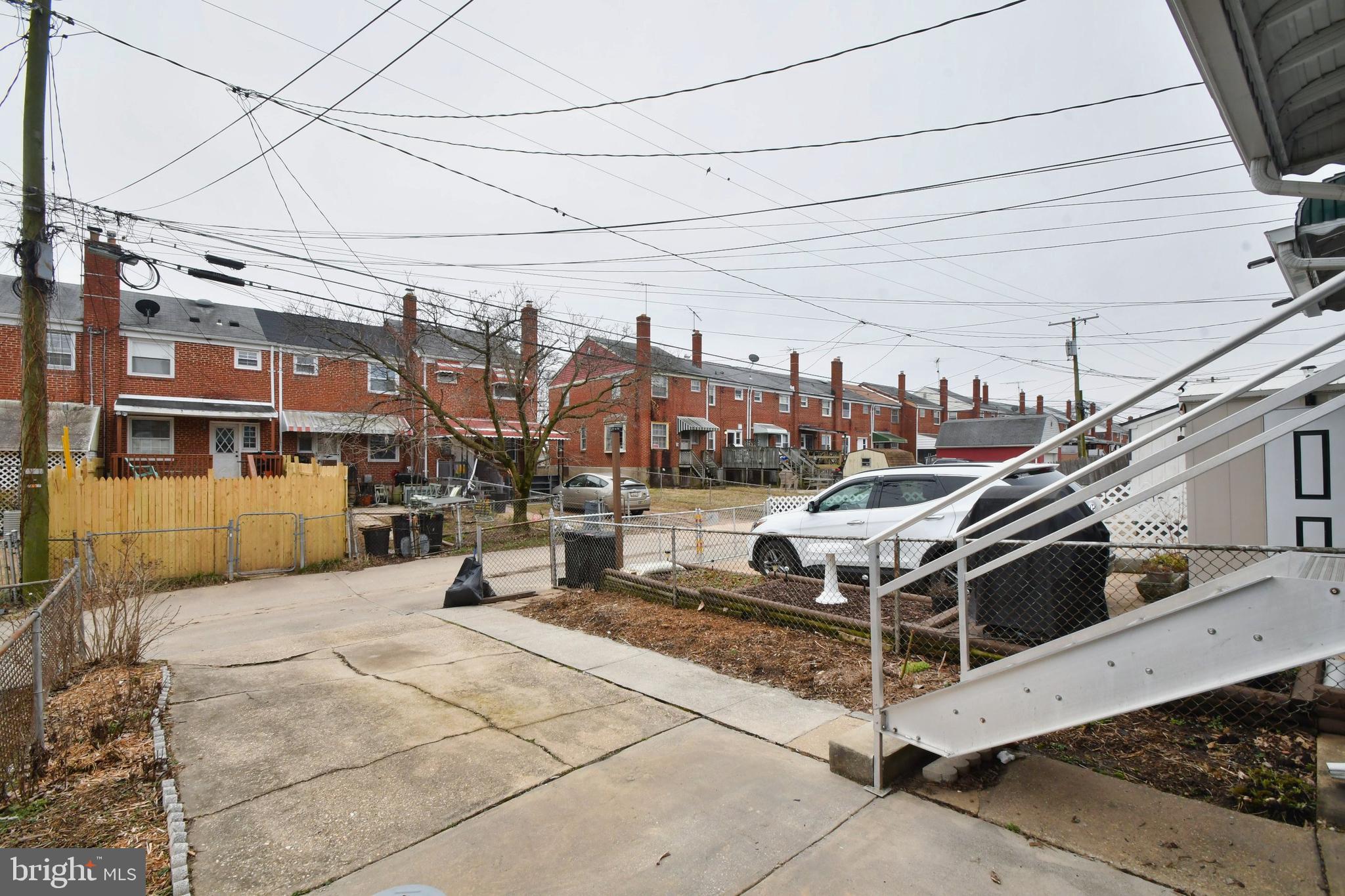 1041 Arncliffe Road Baltimore, MD 21221 - Photo 7 of 40 a view of a house with sitting area and roof
