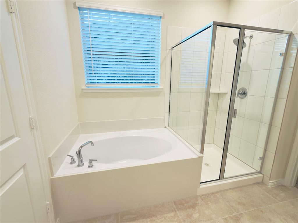 2117 Eugene Street Anna, TX 75409 - Photo 20 of 31 Bathroom with a shower stall and a bath