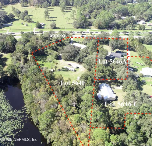 a view of a and covered with trees