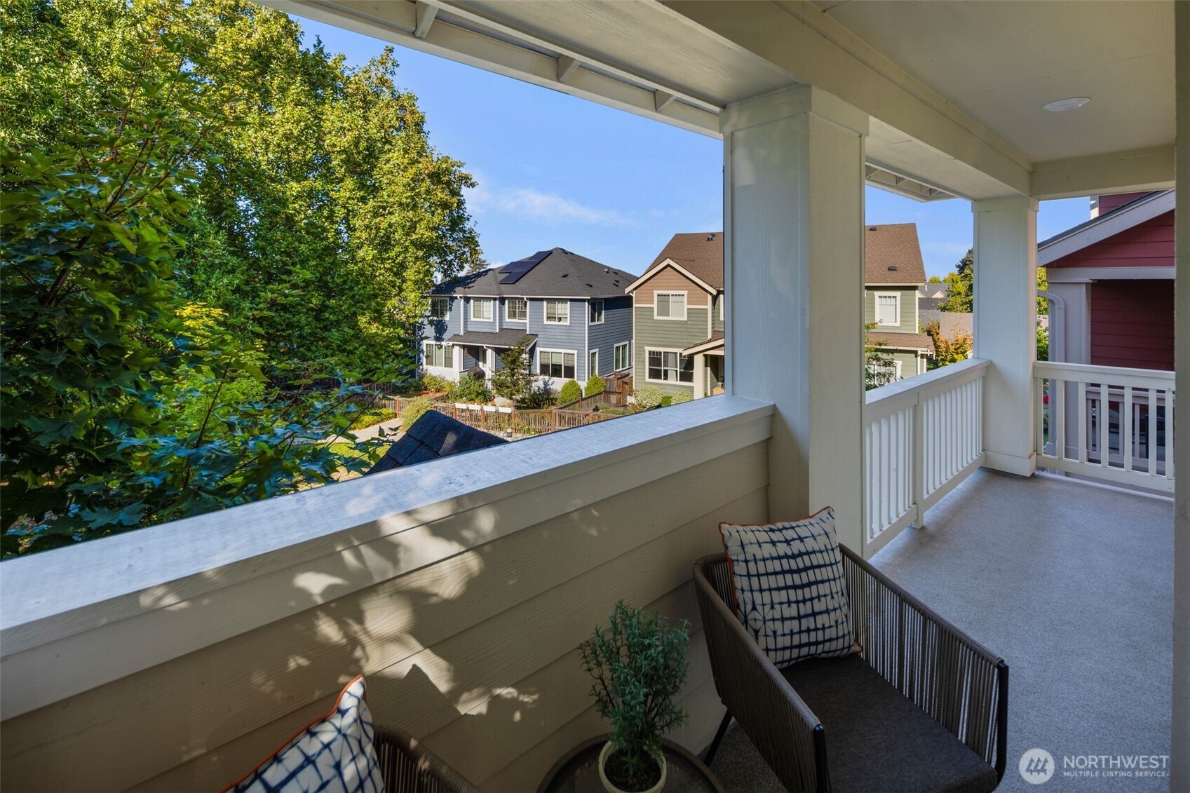 6561 30th Place Southwest Seattle, WA 98126 - Photo 11 of 37 a view of a house with pool and chairs