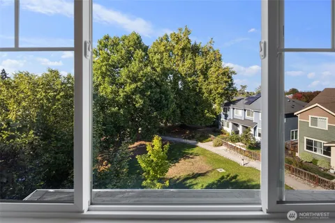 a view of a porch with a tree