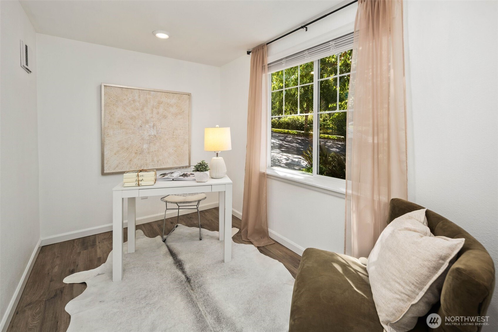 6561 30th Place Southwest Seattle, WA 98126 - Photo 28 of 37 a bedroom with a bed and a window