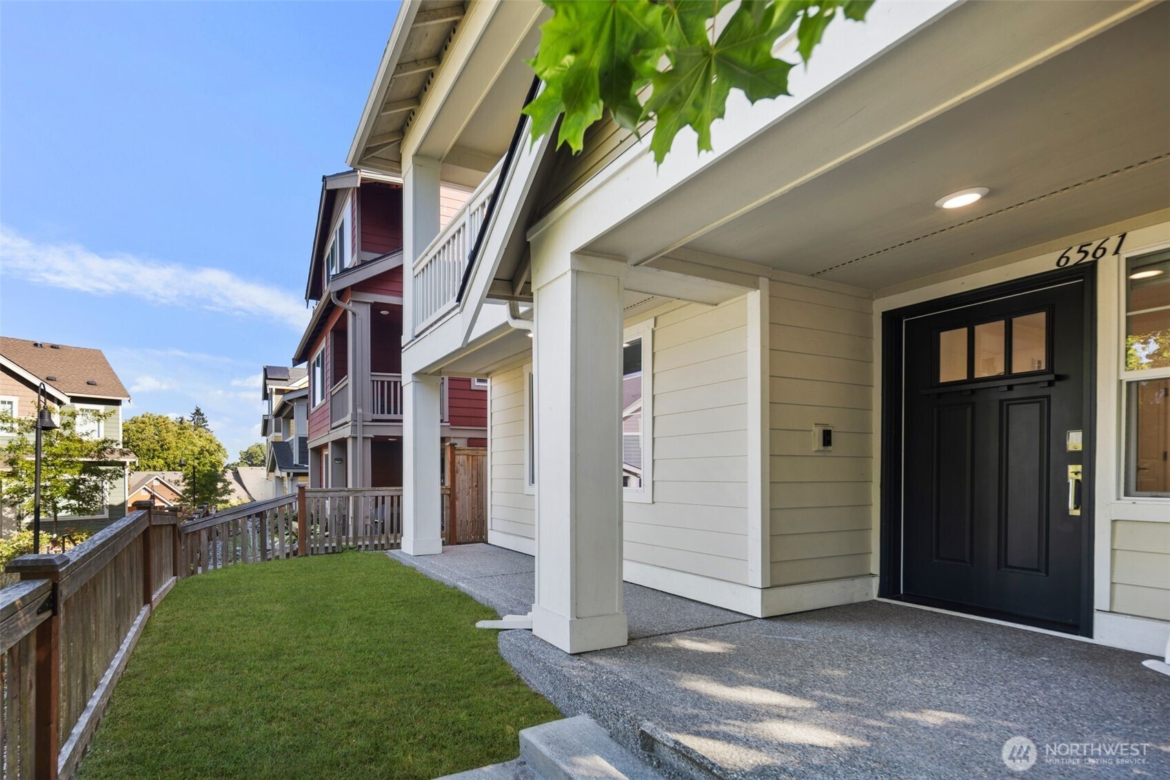 6561 30th Place Southwest Seattle, WA 98126 - Photo 3 of 37 a view of a house with a yard