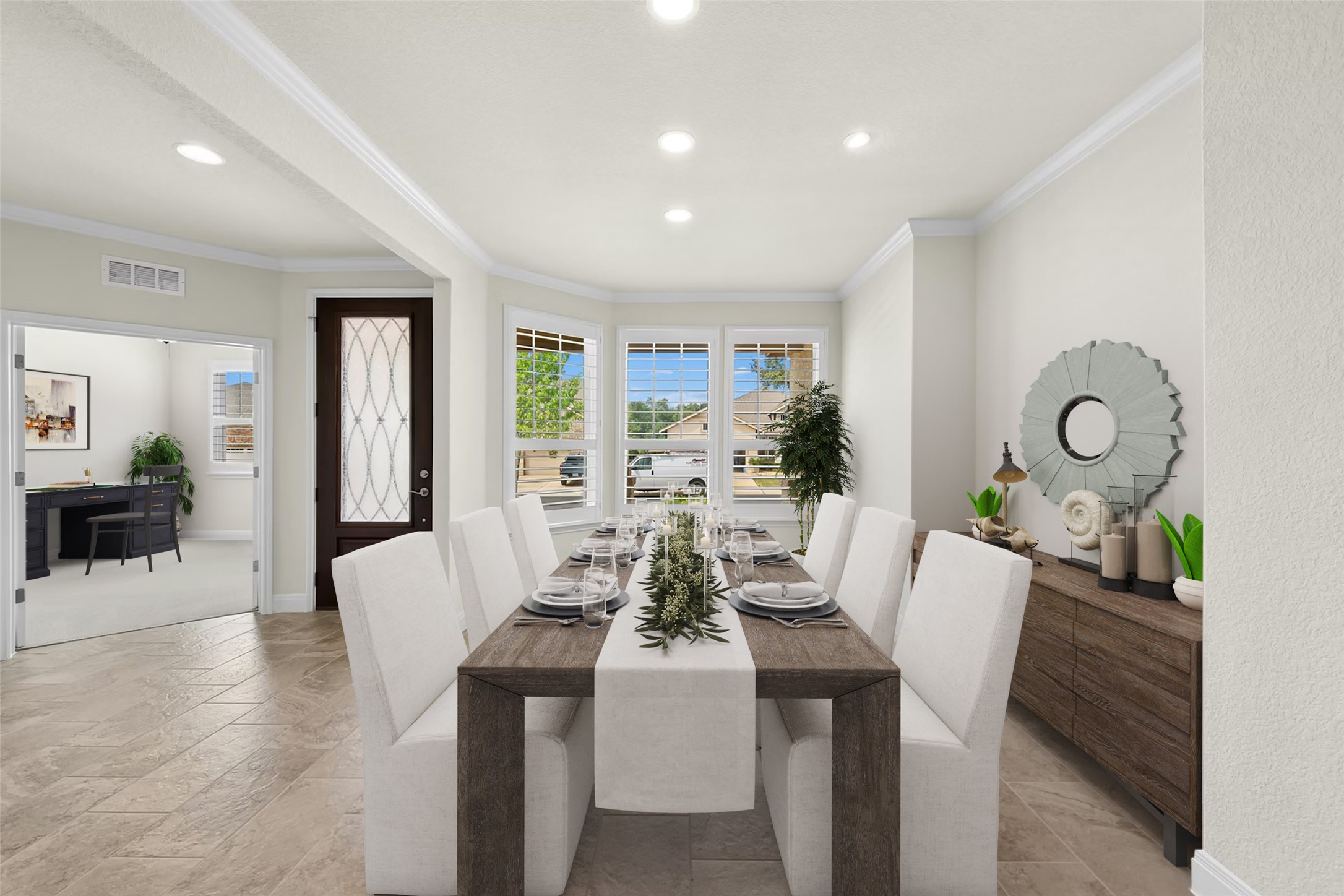 105 Marfa Cove Georgetown, TX 78633 - Photo 4 of 36 a view of a dining room with furniture window and wooden floor