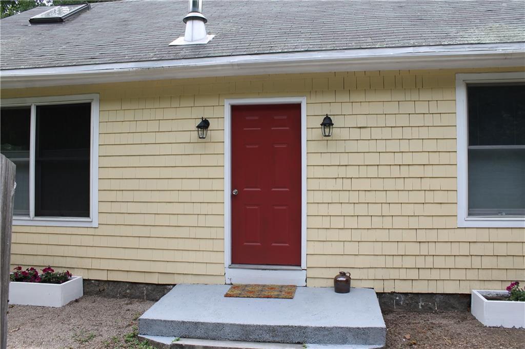 4 Flanders Road East Lyme, CT 06357 - Photo 1 of 1 a view of entrance door of the house